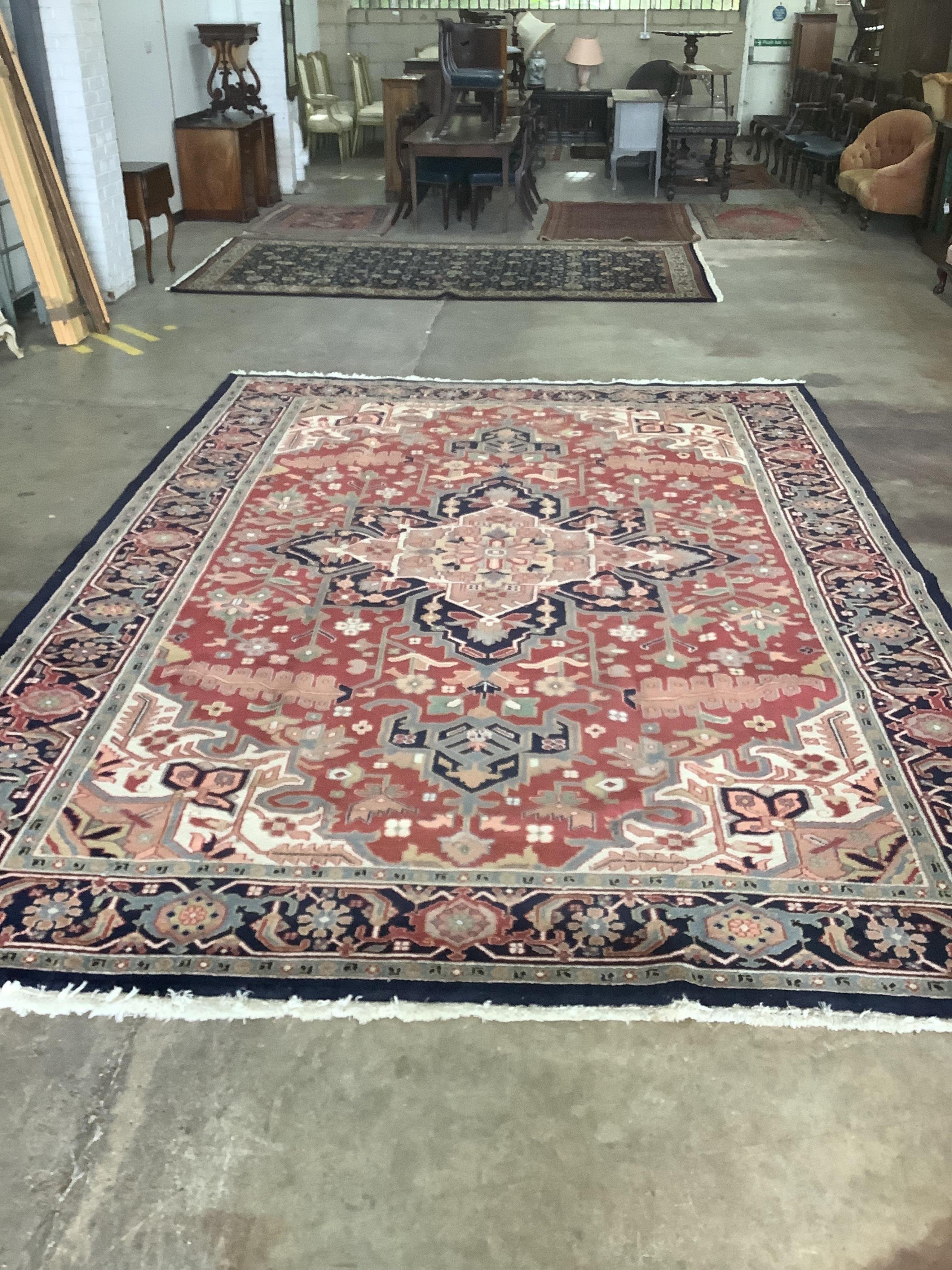 An Indo Persian Heriz carpet, 430 x 300cm. Condition - good